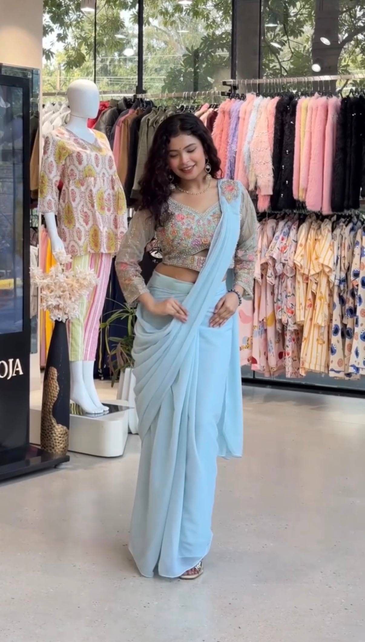 we are launching new superhit trending ready to wear saree with hand work & embroidered stylist blouse & on faux georgette fabric