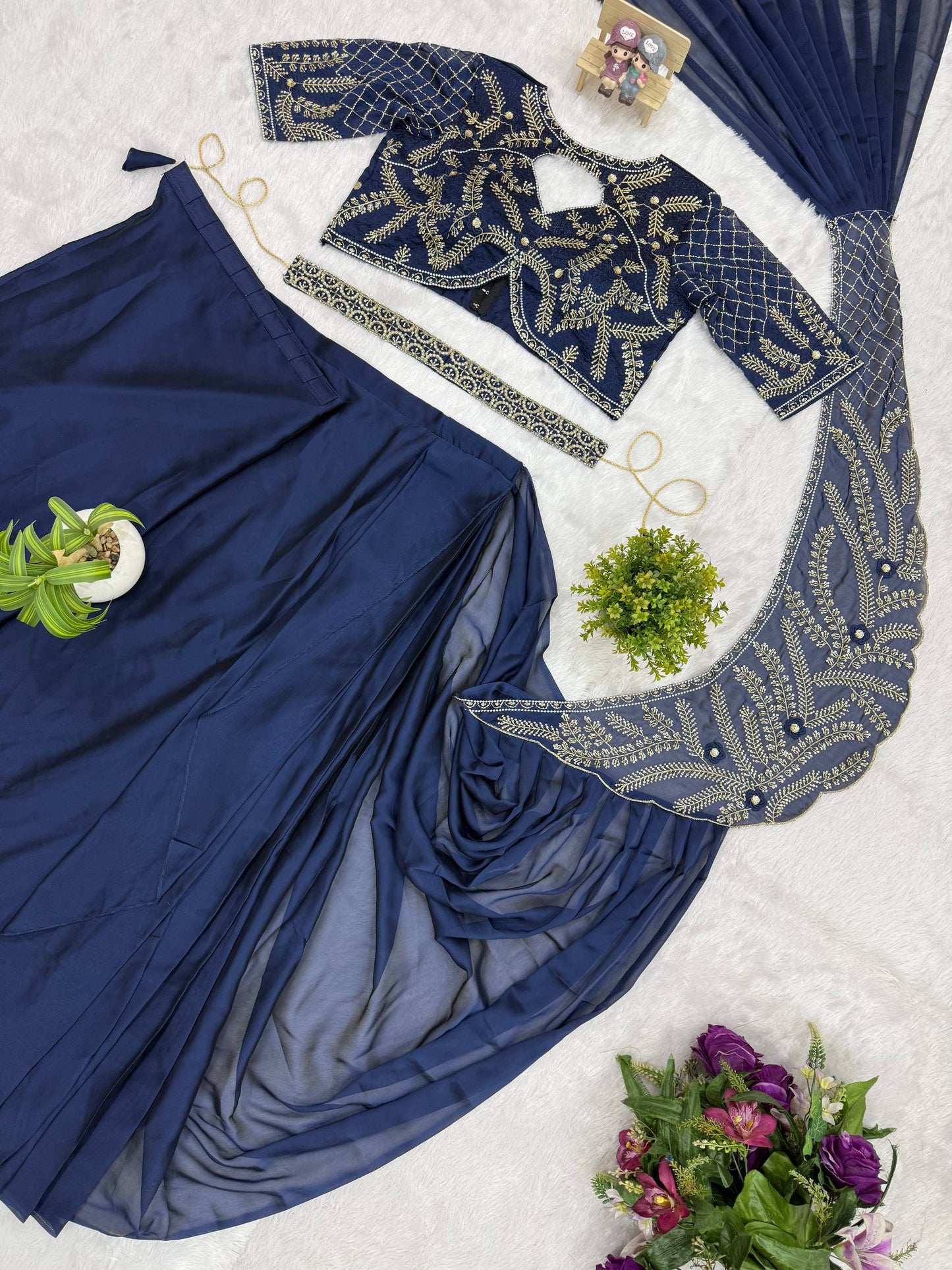 we are launching new superhit trending ready to wear saree with semi-beads & embroidered stylist blouse & on faux georgette fabric